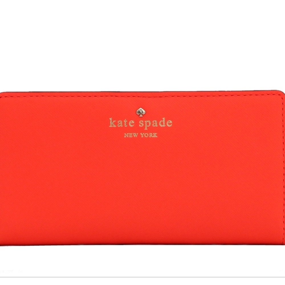 Kate Spade coral colored wallet.